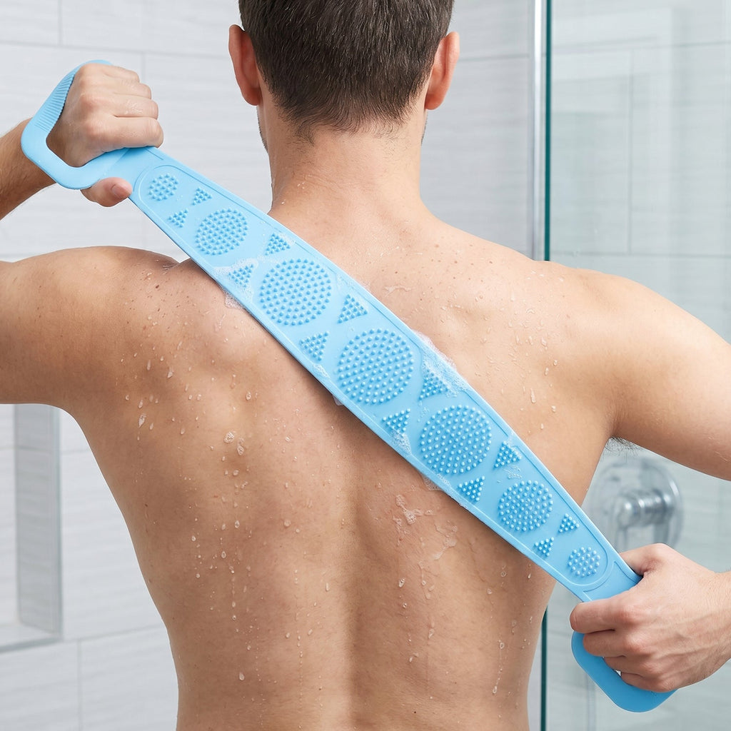 Man using silicone back scrubber in shower